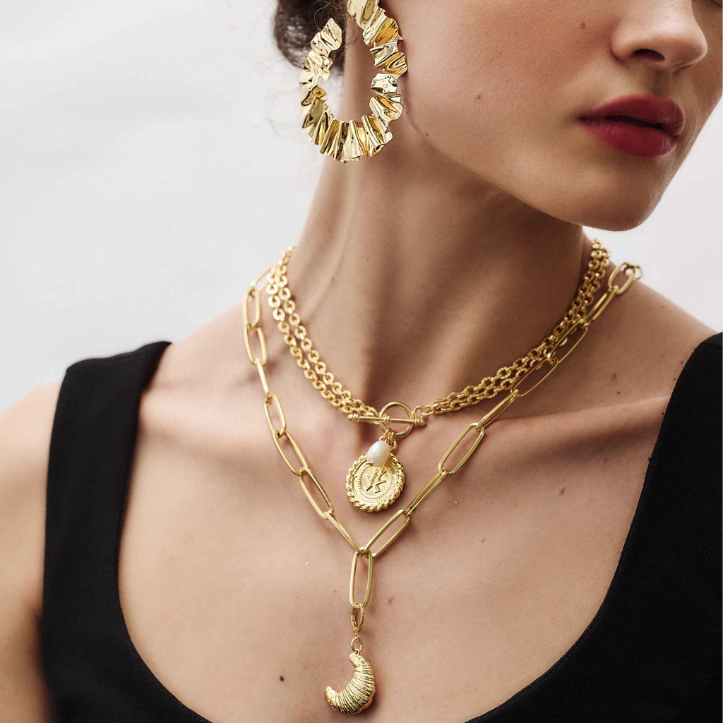 Pingente Croissant Merci Ouro