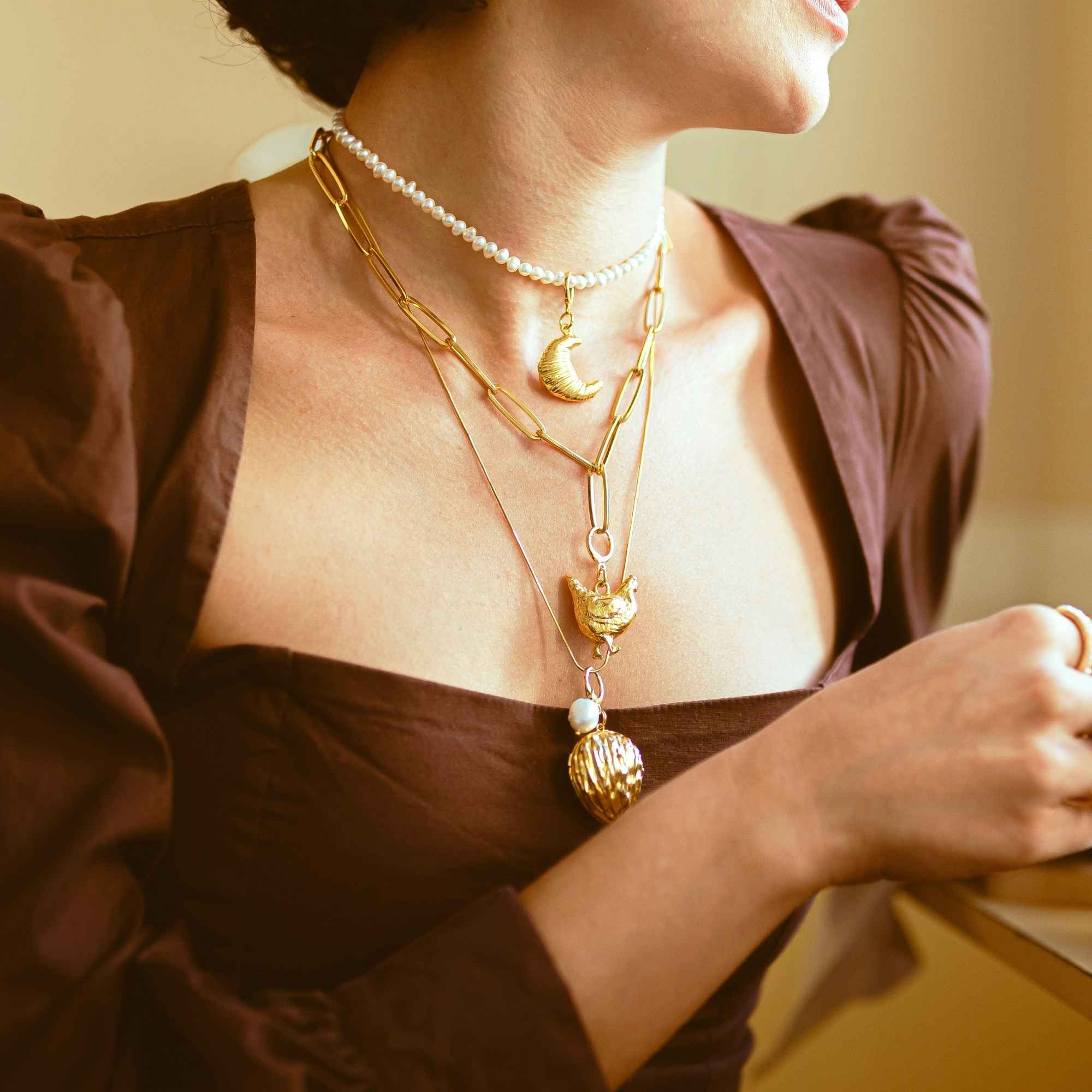 Pingente Croissant Merci Ouro